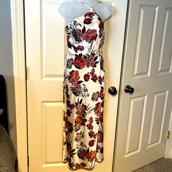 NWOT! Gorgeous silky asymmetrical dress. Has a draped scoop back. - Picture 1 of 11